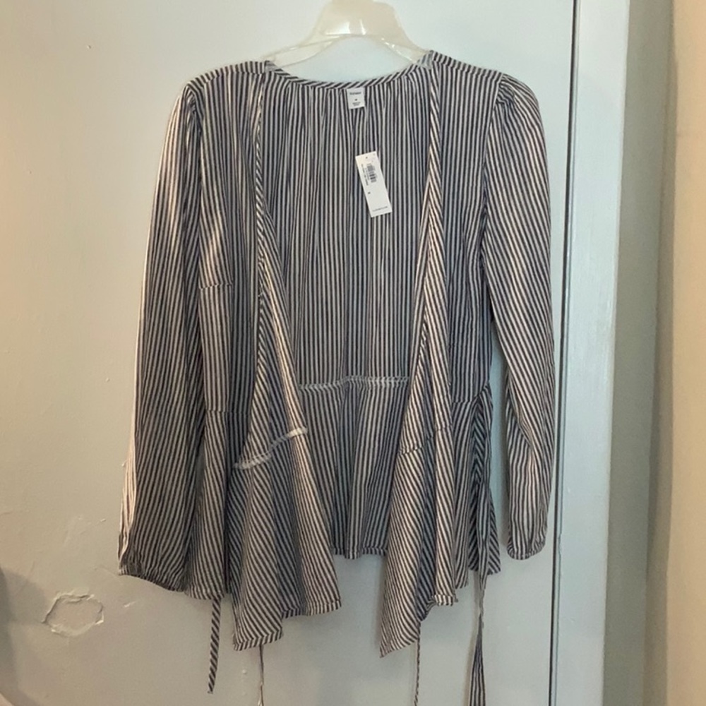 Blue and white striped peplum top.